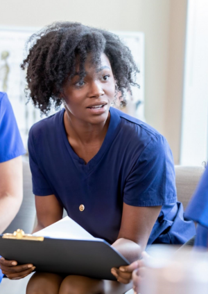 /media/l5vp5rka/nurse-speaking-with-colleague-care-worker-research-participants-needed-2.png