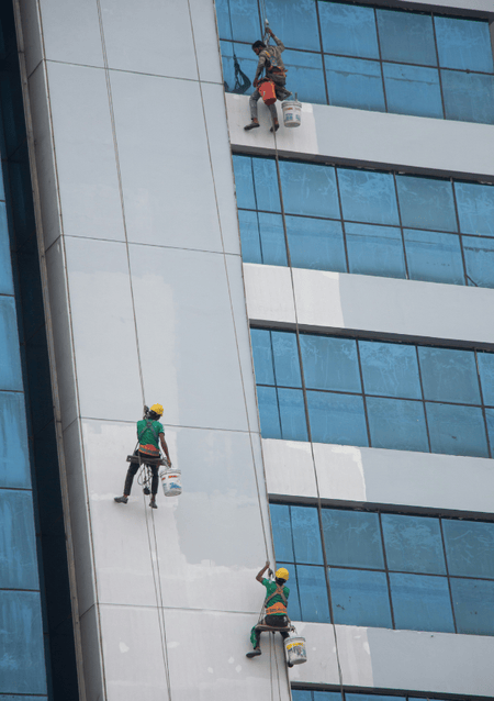 Window Cleaners Hanging Off A Building Strategy For Migrant Worker Welfare Thumbnail